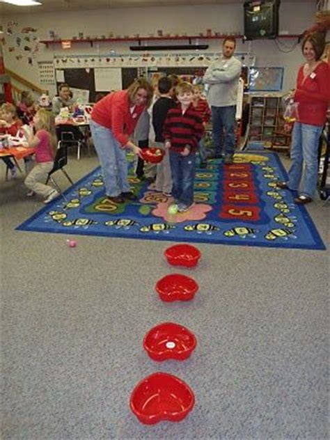 Test how your reactions quick by avoiding the broken and devil hearts and collecting higher score.with valentine. Heart ball toss game, add numbers for a math twist and this might be fun like the grand prize ...