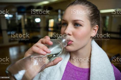 Beautiful Woman Drinking Water After Workout Stock Photo Download