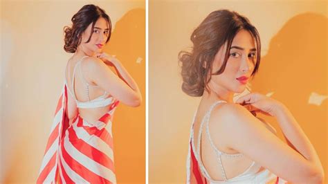 Mahira Sharma Oozes Oomph In Striped Saree And Backless Blouse See Her