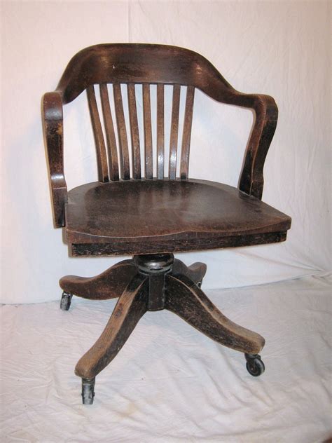 Buy retro office chairs online! Bankers Chair Vintage Heavy Wood from 1930 or 40s Office Desk