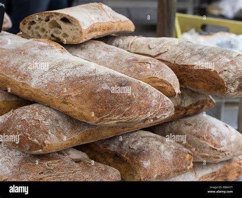 Loaves Of Whole Wheat Bread Stacked In The Market Large Loaves Of