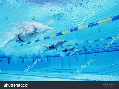 Underwater Shot Four Male Athletes Competing Stock Photo Edit Now