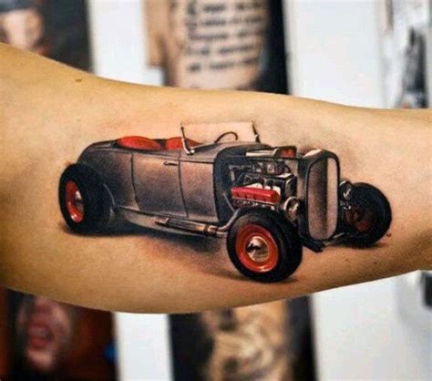 A Mans Arm With An Old Fashion Car Tattoo On It