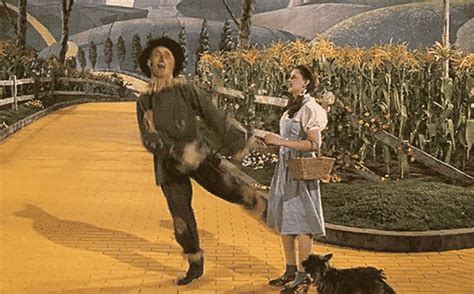 Share the best gifs now >>>. ♥ღRay Bolger as the scarecrow with Judy Garland as Dorothy | Wizard of oz tornado, The wonderful ...