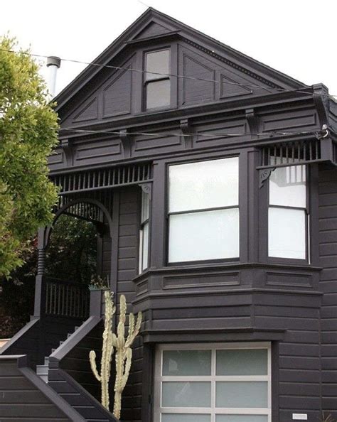 We had picked black fox for the front door and garage door but now that the house is painted. Black Houses: The Pros and Cons of a Dark Painted Facade ...