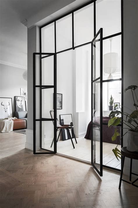 Highly insulating doggy door to keep your home comfortable. Monochrome home with a glass bedroom wall - COCO LAPINE ...