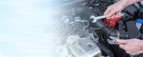 Hands Of Car Mechanic Working On Car Engine Panoramic Banner Stock