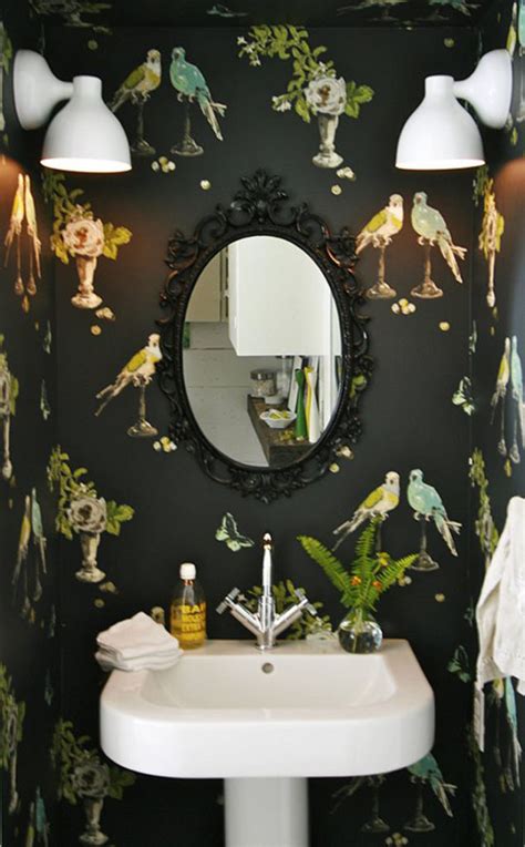A graphic wallpaper can transform a bathroom in an instant. dark wallpaper - Home Decorating Trends - Homedit