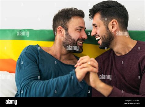 happy gay couple having tender moments in bedroom homosexual love relationship and gender