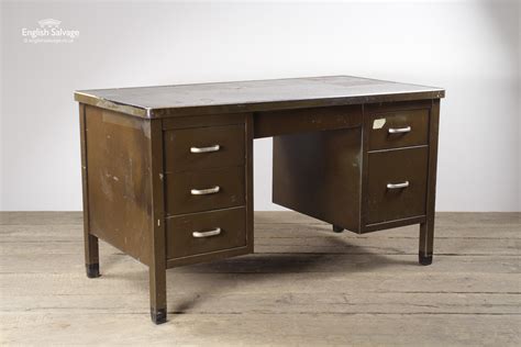 Whether you love the industrial look or you're in need of a durable workstation, a metal desk is a great choice for your office. Salvaged Vintage Industrial Old Metal Desk