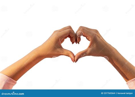 The Woman Lifts Both Her Hands Above Her Head To Make A Heart Symbol That Represents Friendship