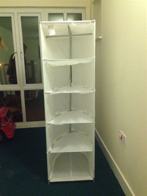 You can either add in additional bars, almost doubling your wardrobe, or you can add in drawers or shelves. IKEA clothes storage- white canvas drawers / wardrobe | in ...