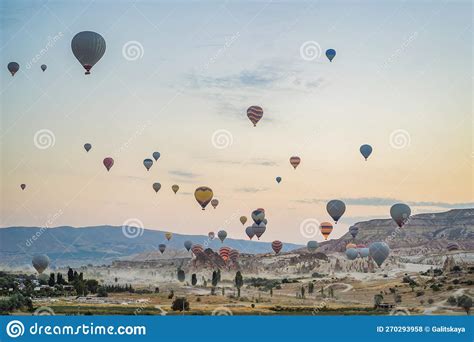Colorful Hot Air Balloon Flying Over Cappadocia Turkey Stock Photo