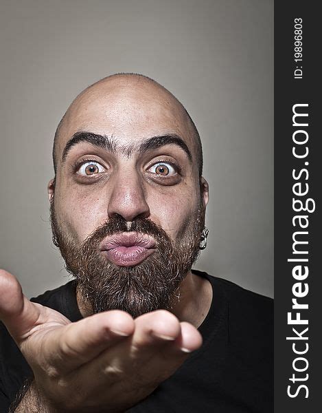 Man With A Bushy Beard That Blows A Kiss Free Stock Images And Photos