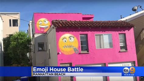 Woman Paints Giant Emojis On Her House—and Neighbors Say Its Revenge
