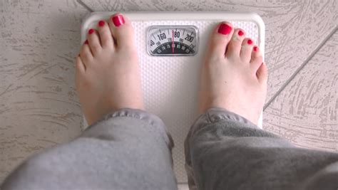 Female Standing On Weight Scale Hd Female Standing On A White