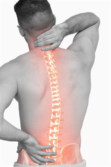 Digital Composite Of Highlighted Spine Of Man With Back Pain Stock