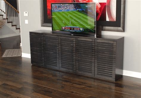 Go handmade with healthy looking wood and build sturdy wooden tv stands that can be added up to serve better in a particular rustic or modern environment! How To Build DIY TV Lift - Mental Itch