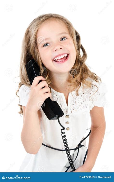 Adorable Smiling Little Girl Speaking By Phone Isolated Stock Image