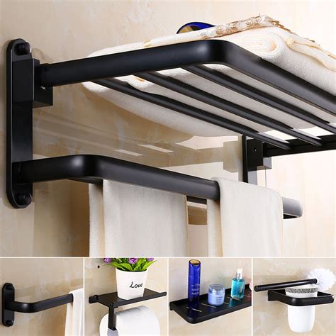 A stylish display, you can use this. Black Bathroom Accessories Wall Mounted Towel Rack Paper ...