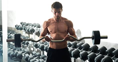How The Reverse Barbell Curl Boosts Biceps Growth