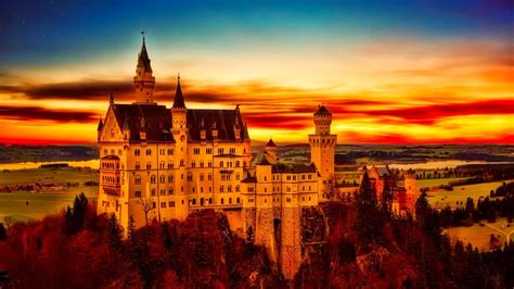 Neuschwanstein Castle At Sunset Wallpaper Backiee