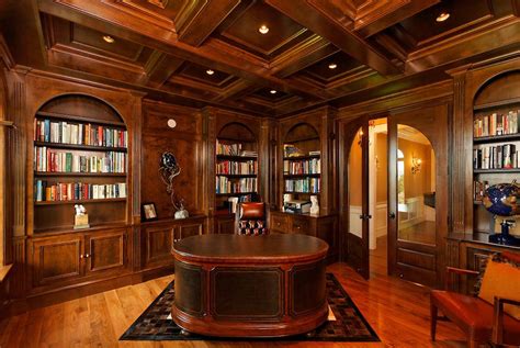 Traditional Home Officelibrary With Dark Paneling And Arched Doorway