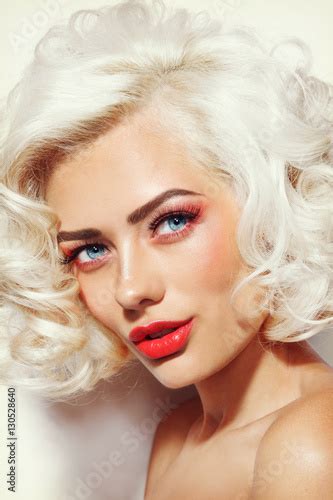 Vintage Style Portrait Of Young Beautiful Sexy Platinum Blonde Pin Up