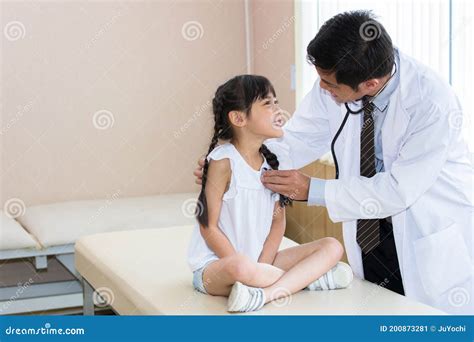 Doctor Is A Physical Exam For The Child Girl Stock Image Image Of