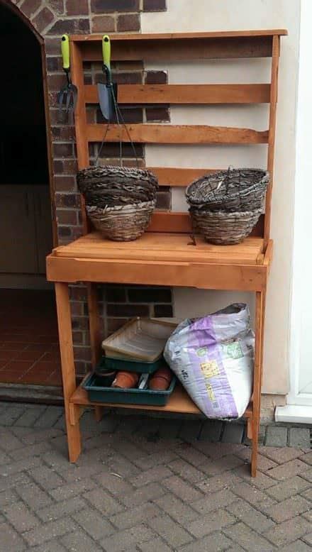 Pallet Garden Potting Bench Planter And Firewood Shed 1001 Pallets