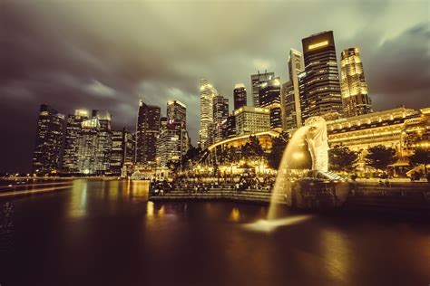 Singapore Skyline And Fountain At Night Image Free Stock Photo
