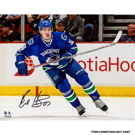 bo horvat vancouver canucks autographed 8 x 10 blue jersey skating photograph imperfect