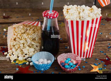 Popcorn Sweet Food And Cold Drink Decorated With 4th July Theme On