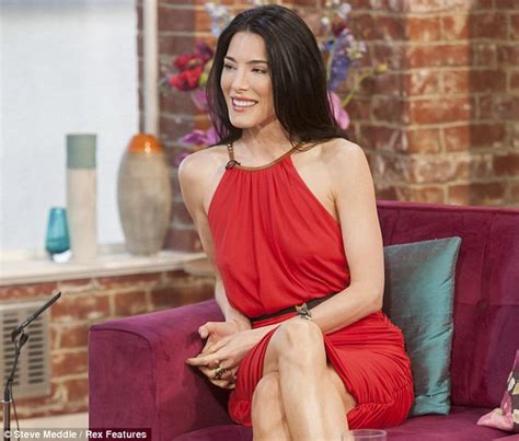 Jaime Murray Looks Flawless In A Chic Red Dress As She Jets In To The