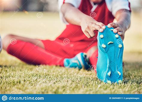 Stretching Foot And Soccer Player On Field For Sports Training