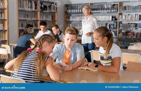 Teenage Students Working In Groups Stock Photo Image Of