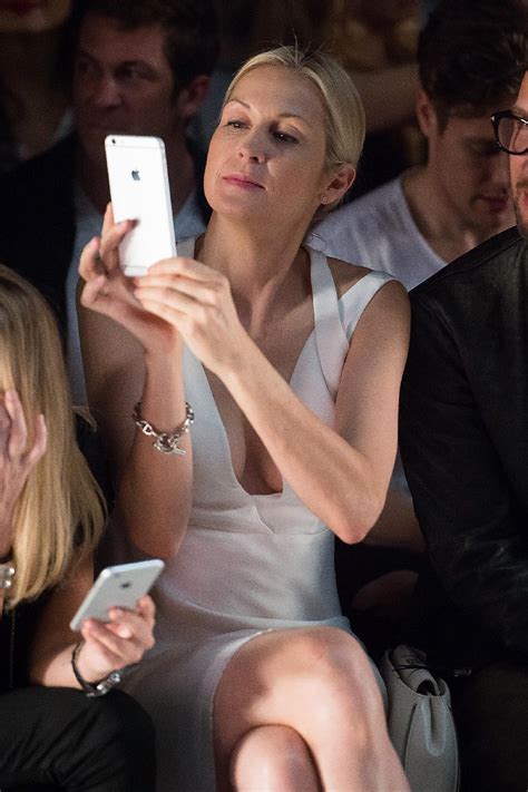 celebrities on their phones at fashion week elle canada