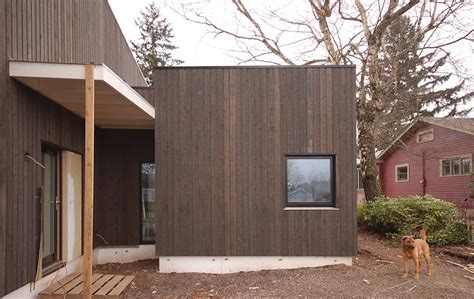 There is almost no way to get a tight enough installation to prevent water penetration. stained cedar siding — In Situ Architecture