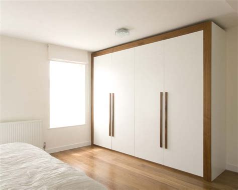 Opt for a sliding door almirah design. Modern Wardrobes of Sunmica Design for Almirah | atzine.com