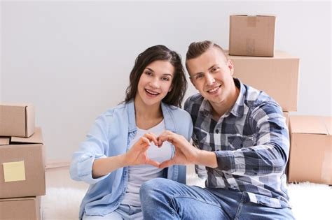 Premium Photo Adorable Loving Couple After Moving Into New House