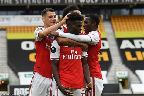 wolves 0 2 arsenal saka and lacazette fire gunners to victory premier league goals arsenal