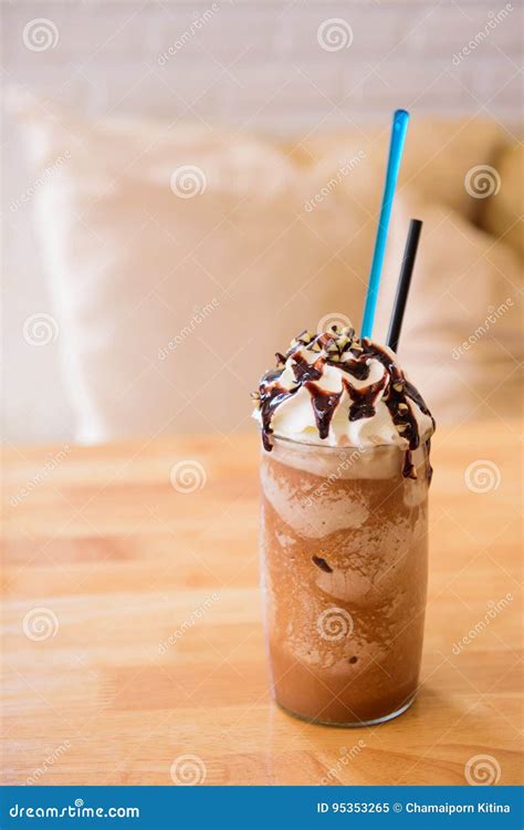 Tall Glass Of Delicious Cold Iced Coffee Float Or Milkshake Topped With