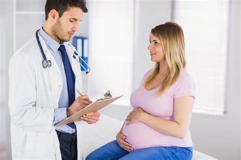 Pregnant White Woman And Her Cute Male Doctor Woman S Foundation