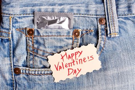 Premium Photo Valentines Day Card And Condom Greeting Card On Denim Be Safe While Celebrate