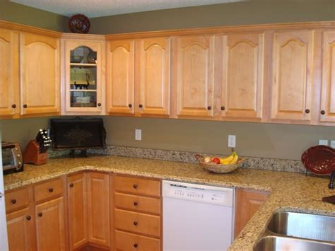 Like a somewhat dark yellow or possibly a tan. Help! kitchen paint colors with oak cabinets - Home ...