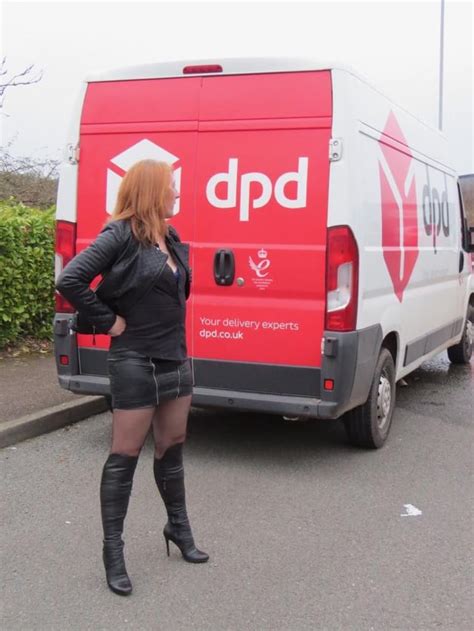 Redhead Leather Stockings Boots On The Street Beside A Dpd Van