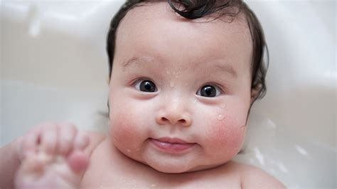 Unless your baby's skin is sweaty, oily, or dirty, plain water is enough; How To Wash Your Baby's Face