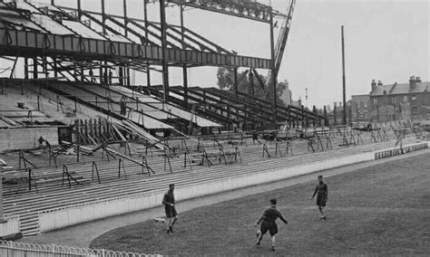 • • • arsenal f.c. Players train while the new East stand is built. 1934