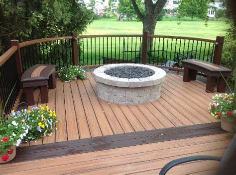 There are several factors to consider when using fire pits and fireplaces in conjunction with trex decking. Michigan Brick Patio Installation | Woodcraft Design & Build