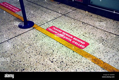 Wait Behind Line Sign At An Airport Stock Photo Alamy